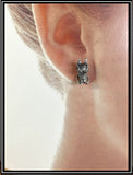 Stainless steel 3D Dragon head post Earrings from Rubini Jewelers, shown on adult woman's ear